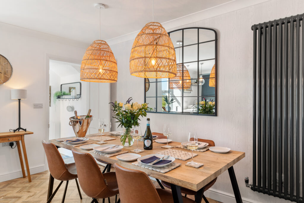 Dining area seating six at Enfield House holiday cottage